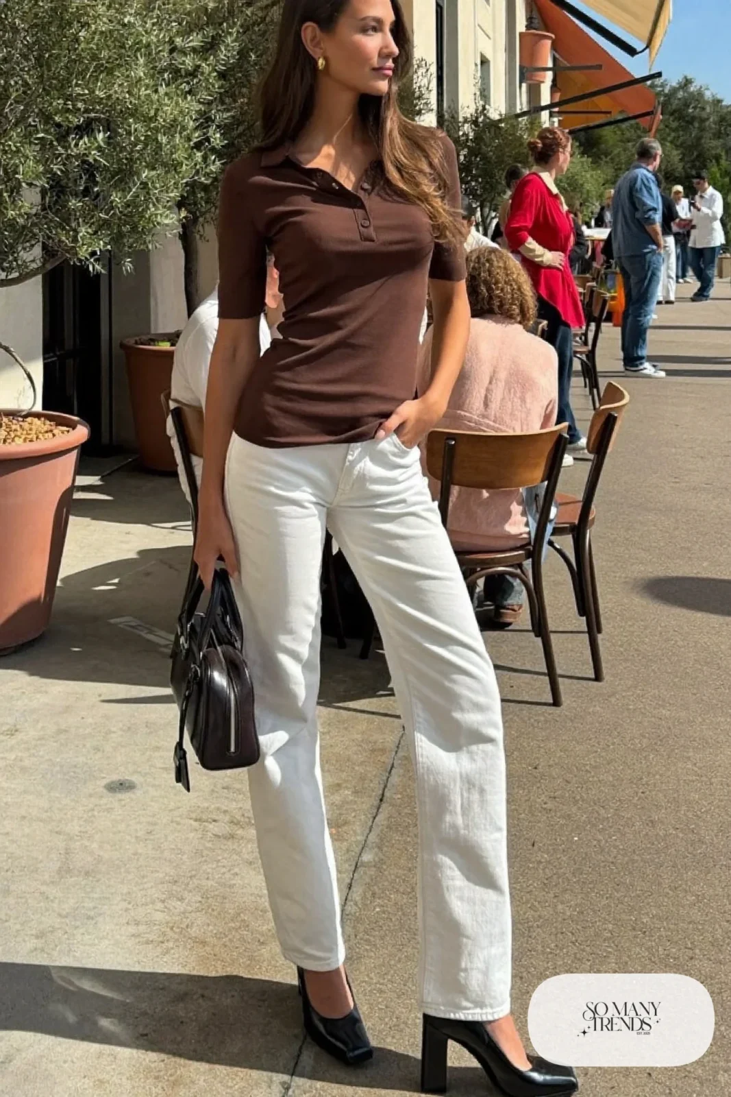 Woman in white straight jeans, chocolate brown knit polo and black platform pumps, outfit 12