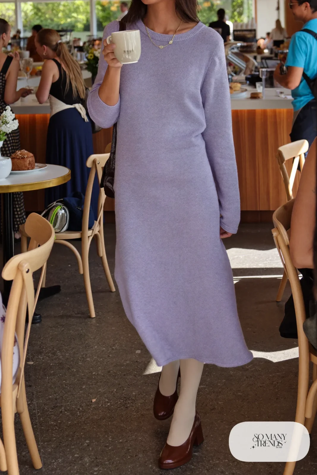 Woman in a loose lilac knit midi dress, cream tights and chocolate platform pumps, outfit 28
