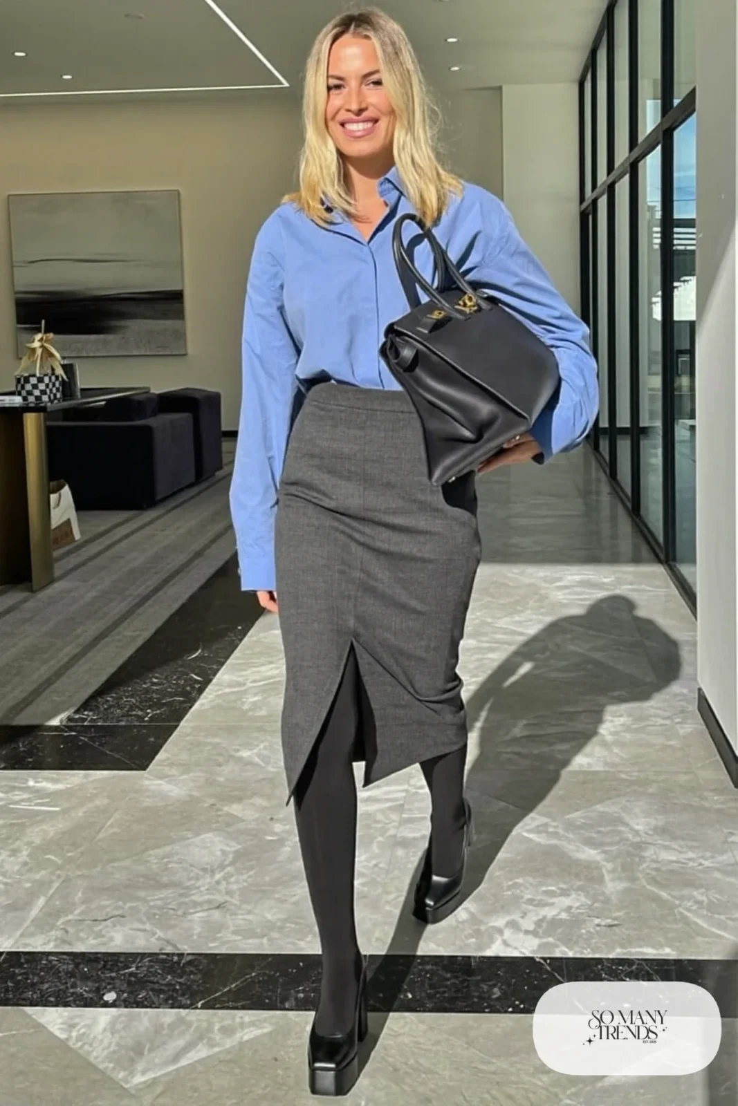 Woman in a charcoal pencil midi skirt, powder blue shirt and black platform pumps, outfit 26