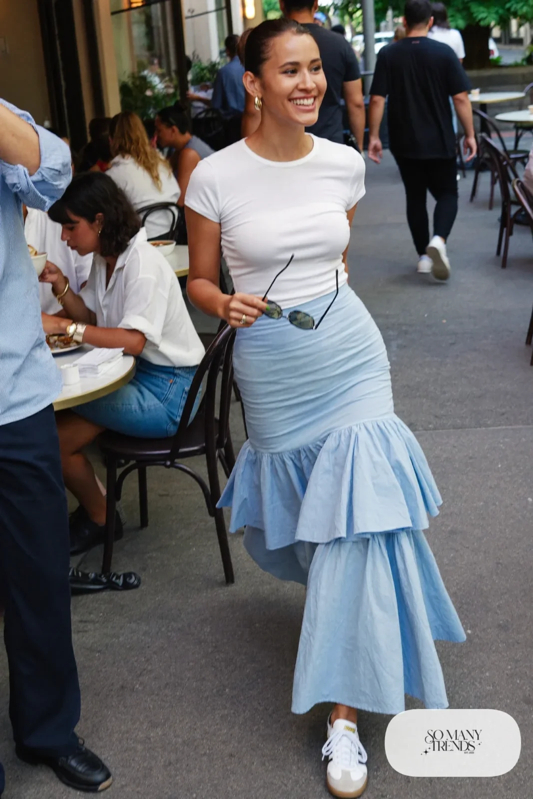 Powder blue ruffled midi skirt with fitted white cotton tee tucked in and white sneakers, outfit 2