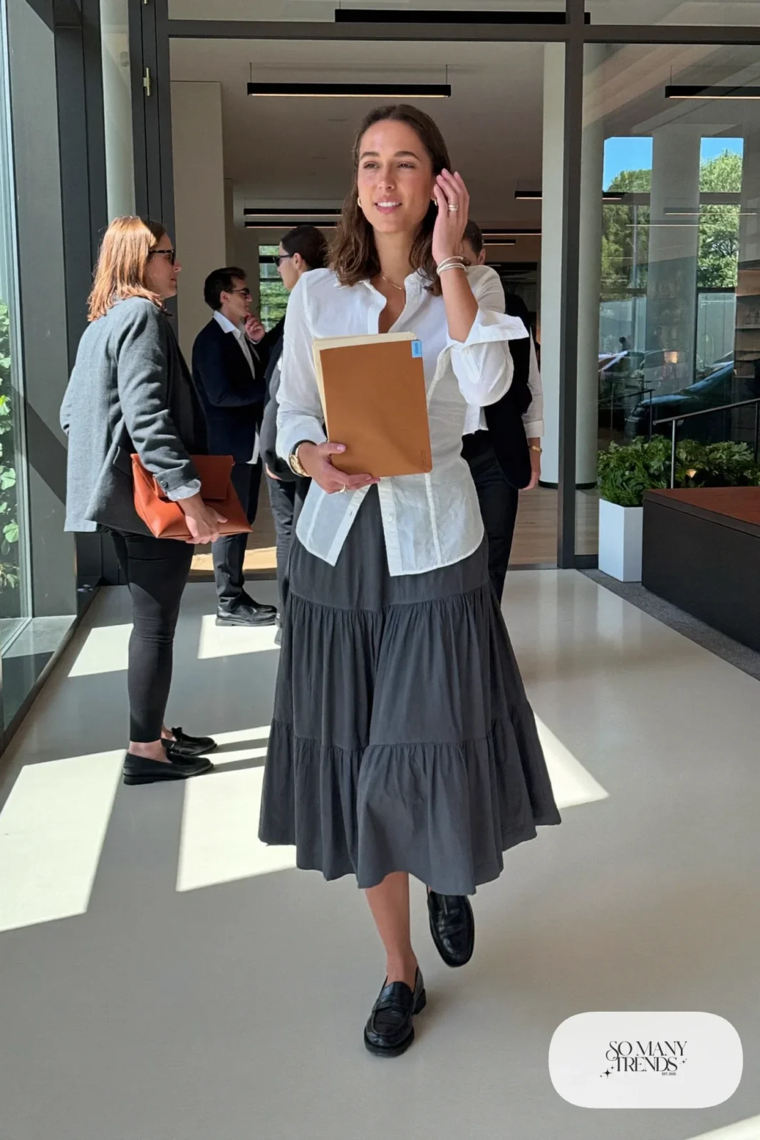 Gray tiered midi skirt with fitted white poplin shirt tucked in and black loafers, outfit 14