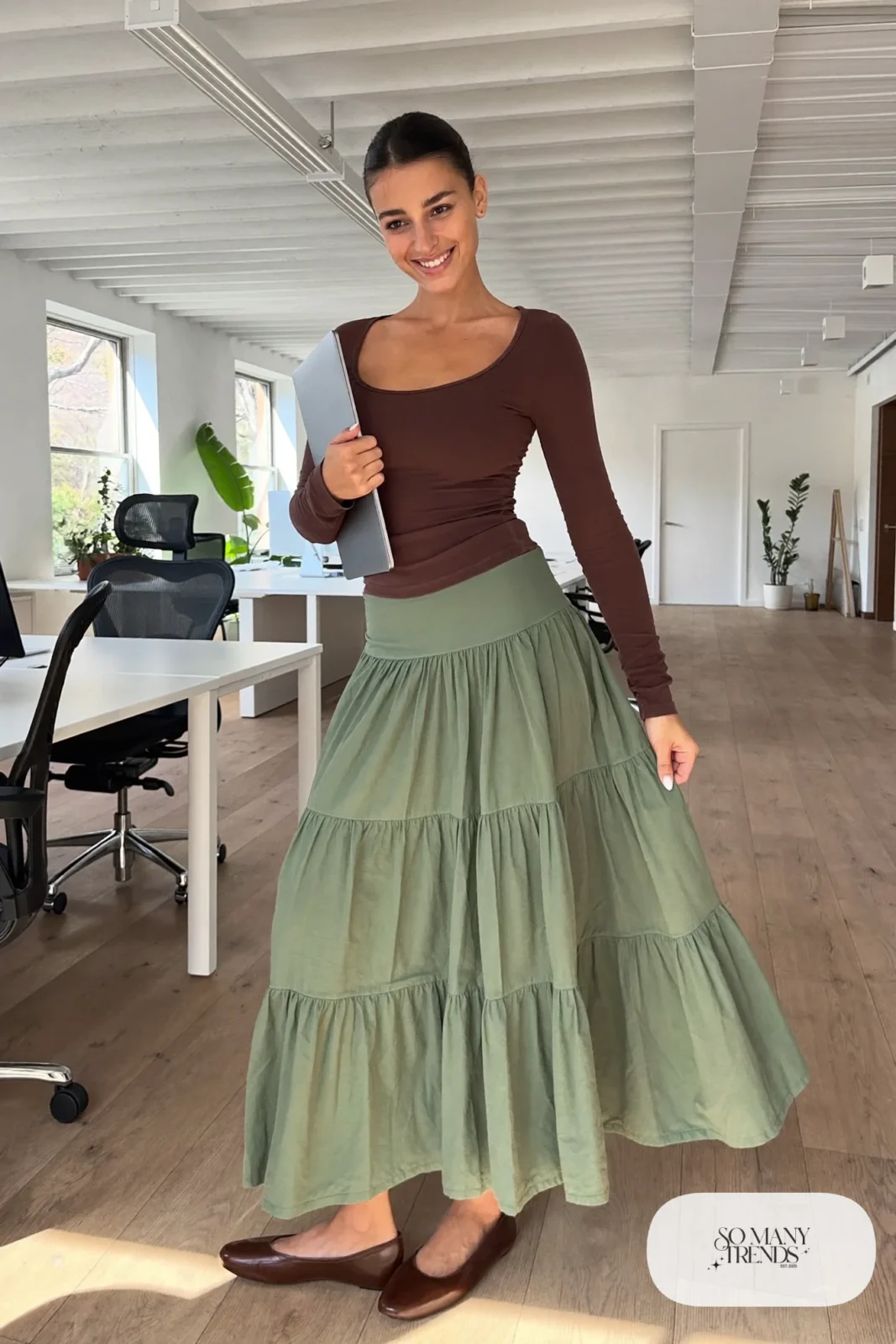 Sage green tiered midi skirt with fitted brown long-sleeve scoop neck tee and brown flats, outfit 18