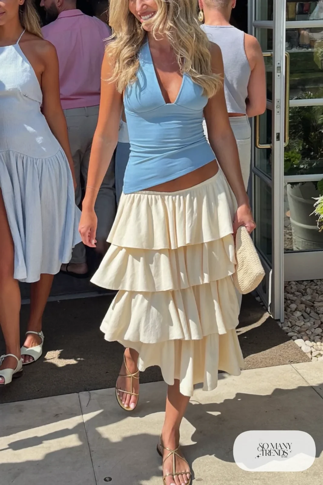 Cream ruffled tiered midi skirt with fitted powder blue halter top and gold strappy sandals, outfit 21