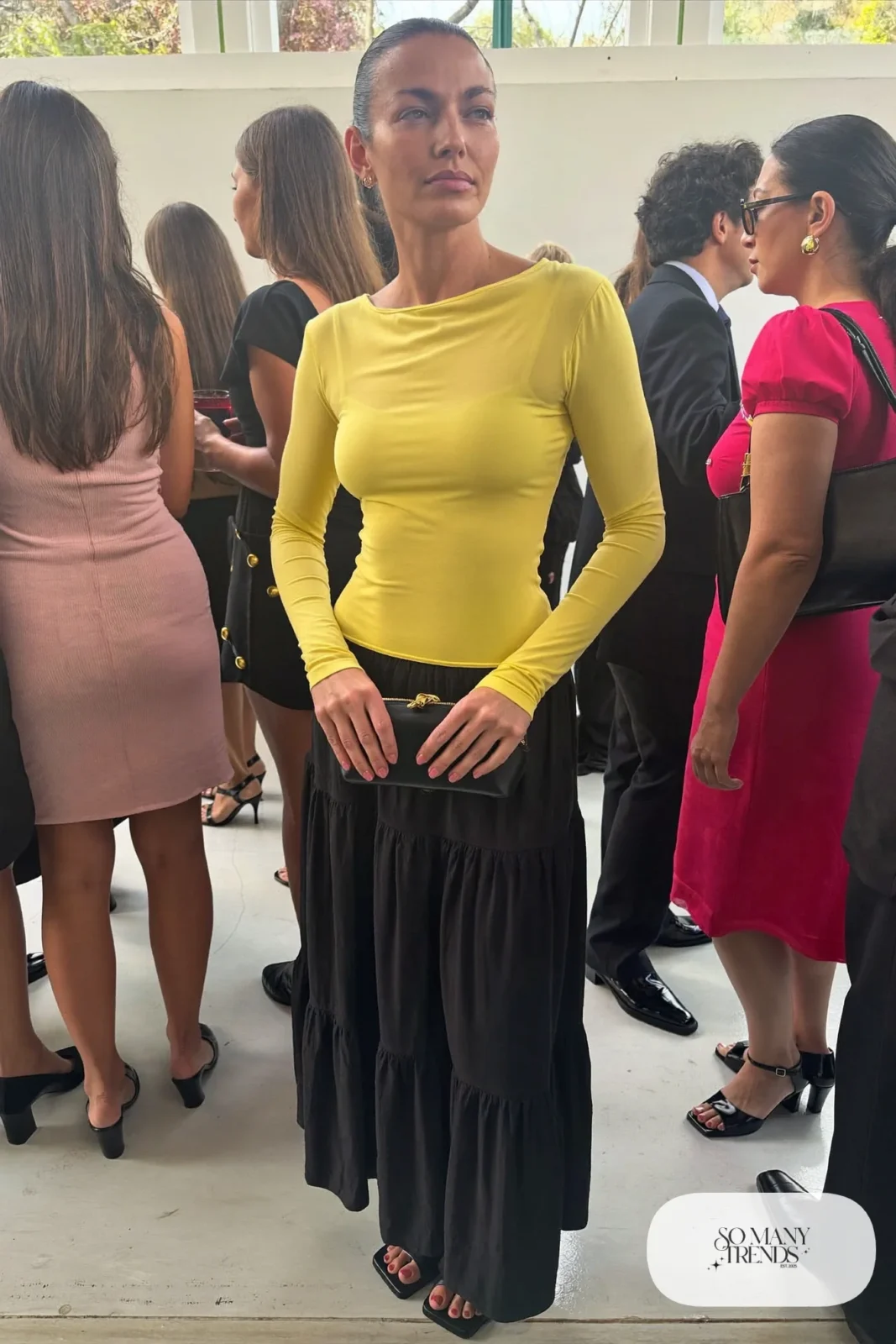 Black tiered maxi skirt with fitted butter yellow long-sleeve top and black block heel sandals, outfit 24