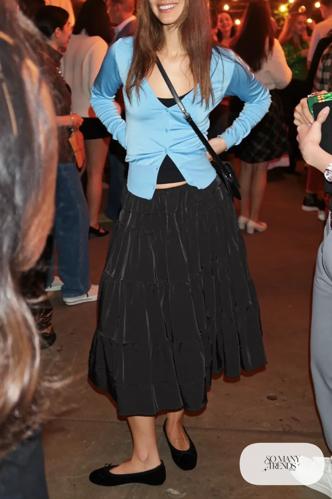 Black tiered midi skirt with fitted powder blue cropped button cardigan over black camisole and black ballet flats, outfit 28