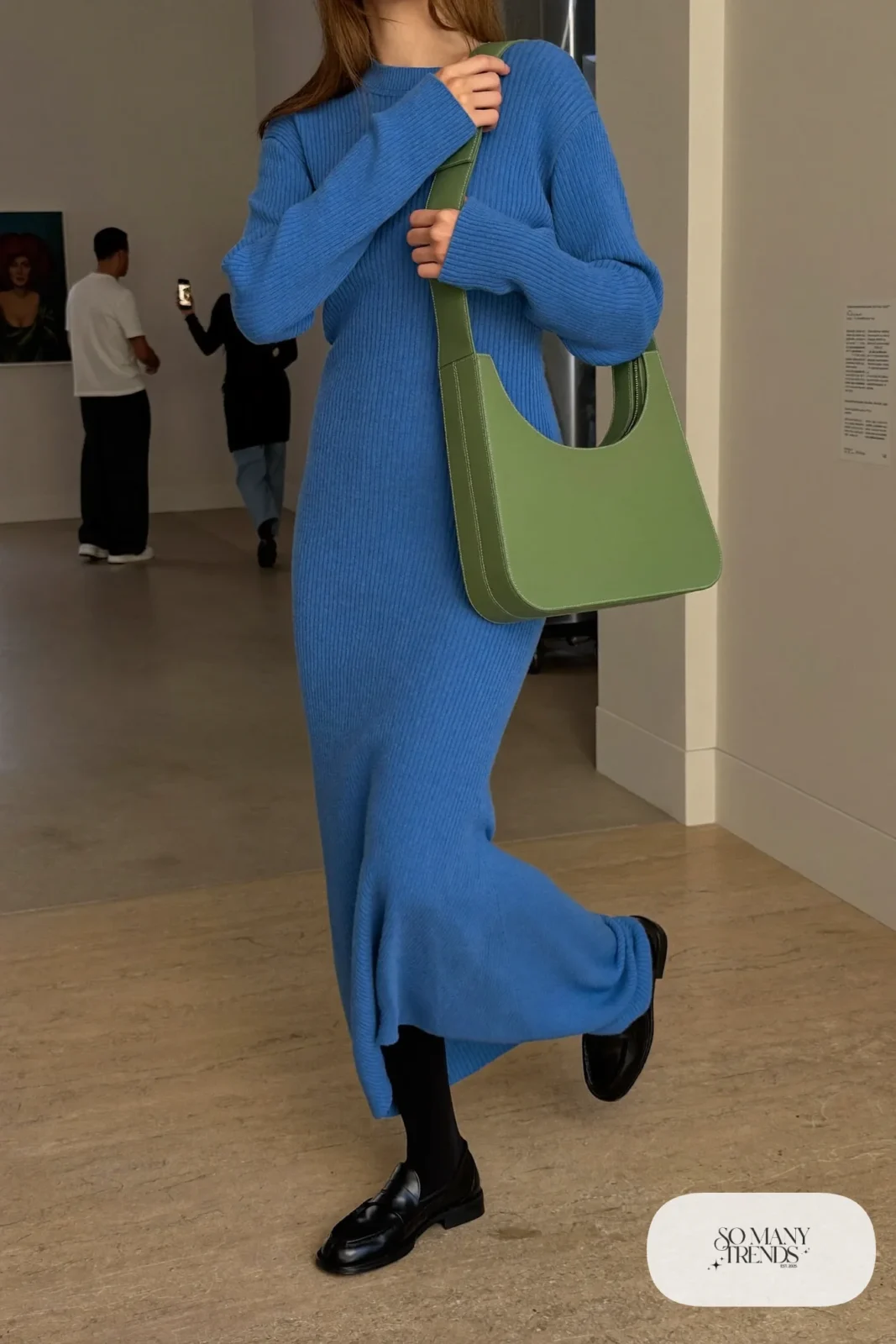Cobalt blue loose ribbed knit maxi dress with a green shoulder bag, sheer black tights and black loafers, outfit 7
