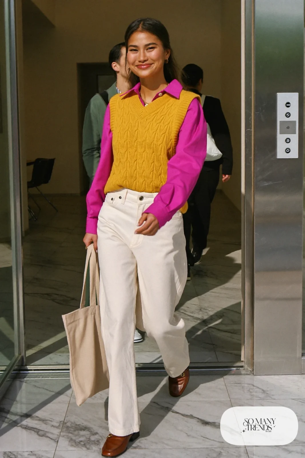 Mustard yellow knit sweater vest over a hot pink poplin shirt with cream straight pants and brown loafers, outfit 18