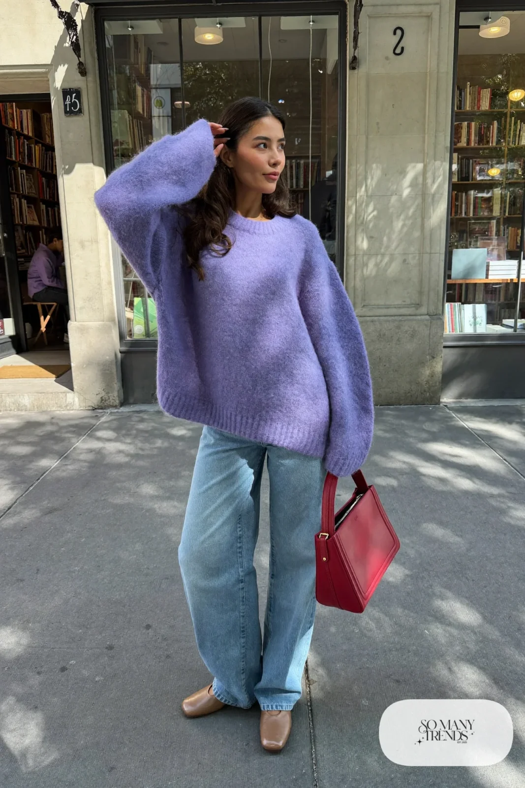 Soft lilac knit sweater, light-wash wide-leg jeans, tan flats and a tomato red structured bag, outfit 24