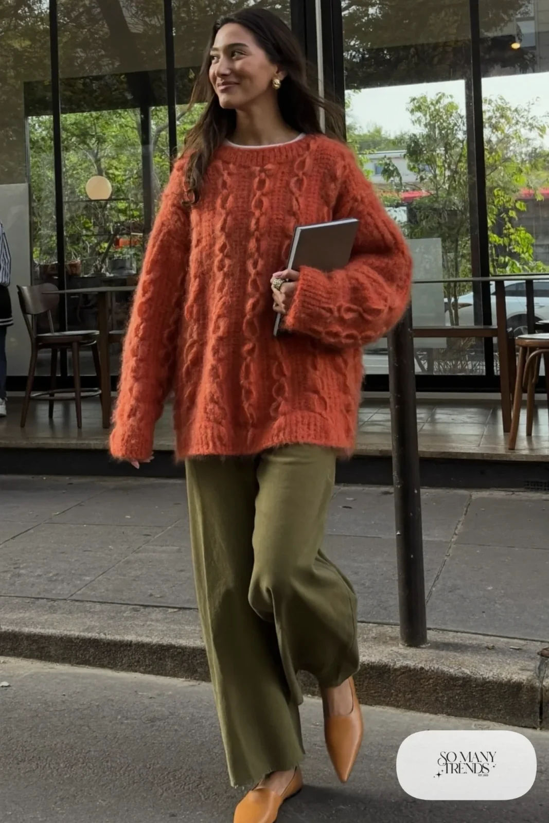 Burnt orange oversized fuzzy knit sweater, olive green wide-leg pants and tan leather flats, outfit 8
