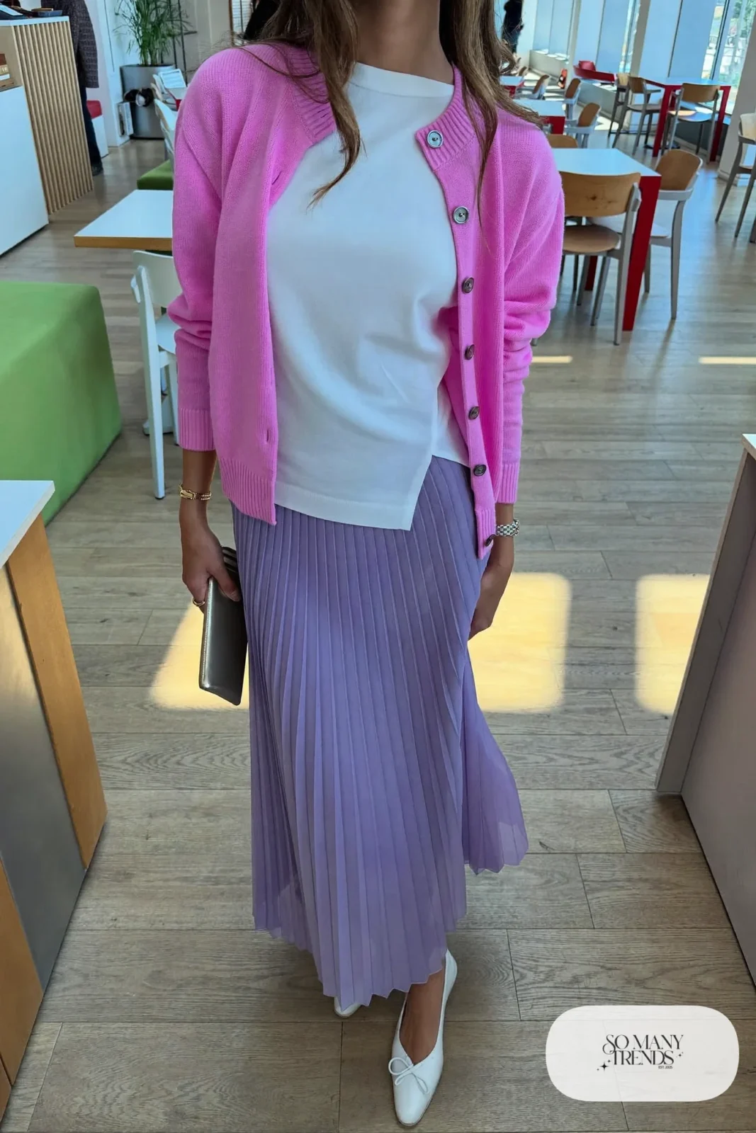 Hot pink knit cardigan over a white top with a long lilac skirt and white flats, outfit 21
