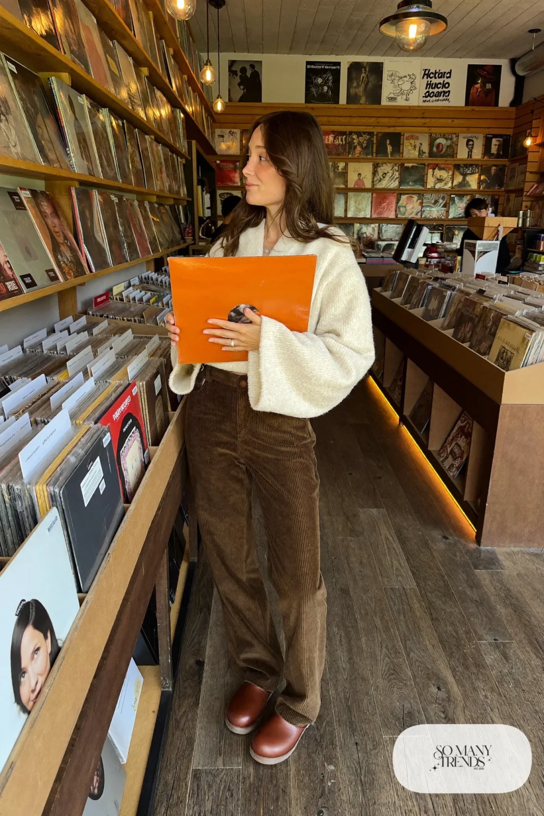 Look 7: cream bell sleeve top, chocolate brown corduroy straight-leg pants and brown leather clogs