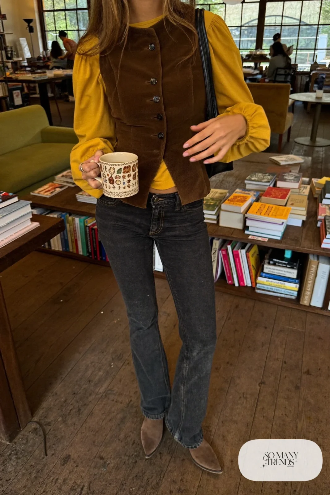 Look 19: mustard bell sleeve top under a chocolate brown corduroy vest with dark jeans and brown suede boots