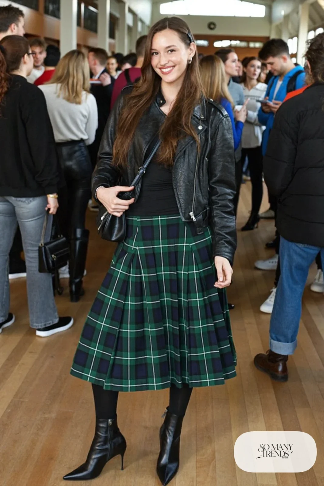 Forest green plaid midi skirt with black leather moto jacket, black top, black tights and black heeled boots, outfit 18