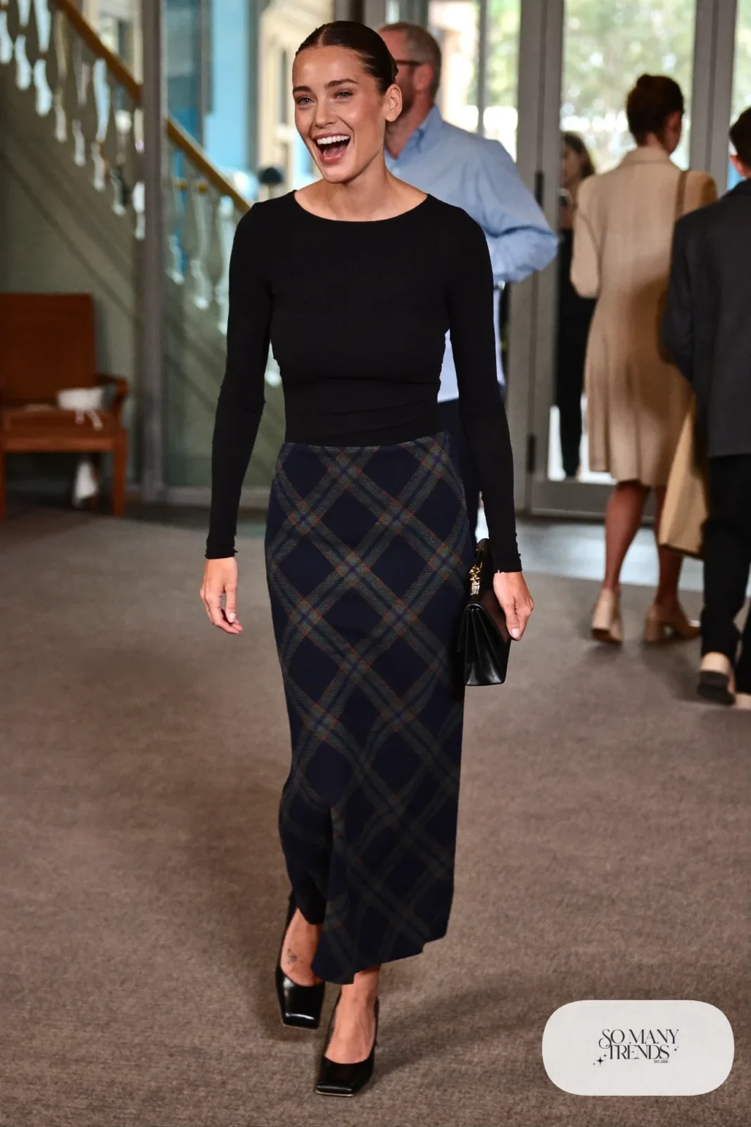 Navy plaid maxi skirt with fitted black long sleeve top, slim belt, bare ankles and black heeled sandals, outfit 20