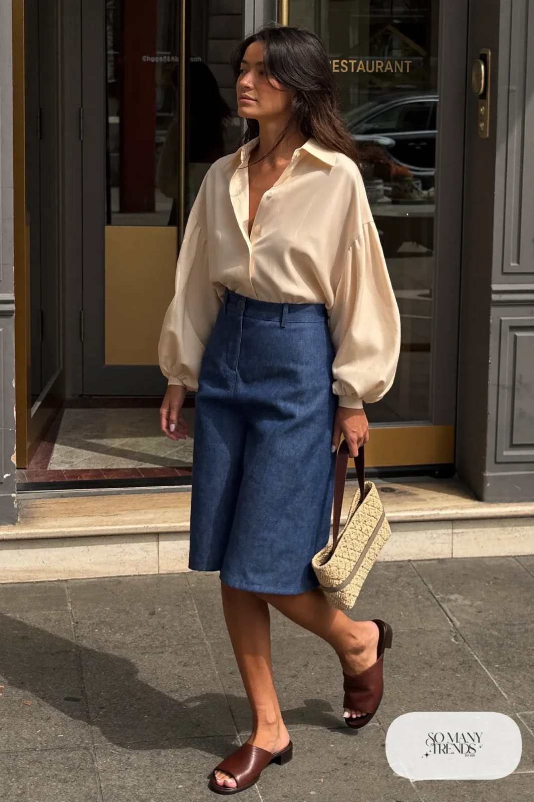 Look 2: cream bell sleeve blouse, indigo cotton midi skirt and brown leather sandals