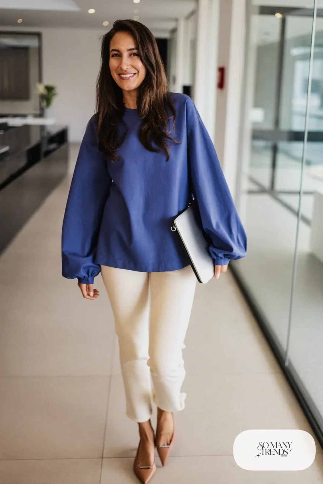Look 9: indigo bell sleeve top, cream slim ankle pants and tan pointed-toe flats
