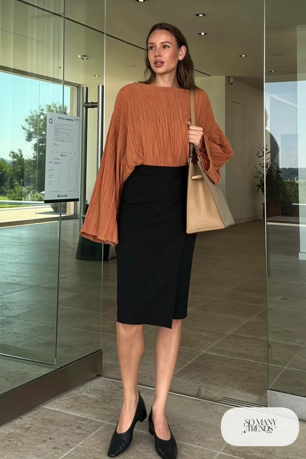 Look 15: terracotta bell sleeve top, black pencil skirt and black low block-heel pumps