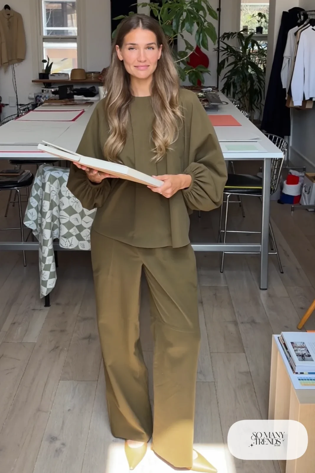 Look 16: olive bell sleeve top with matching olive wide-leg pants, thin brown belt and tan pointed flats