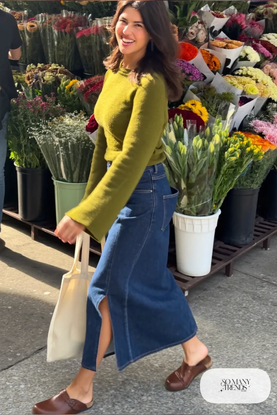 Look 21: olive bell sleeve top, indigo denim midi skirt with front slit and brown leather clogs