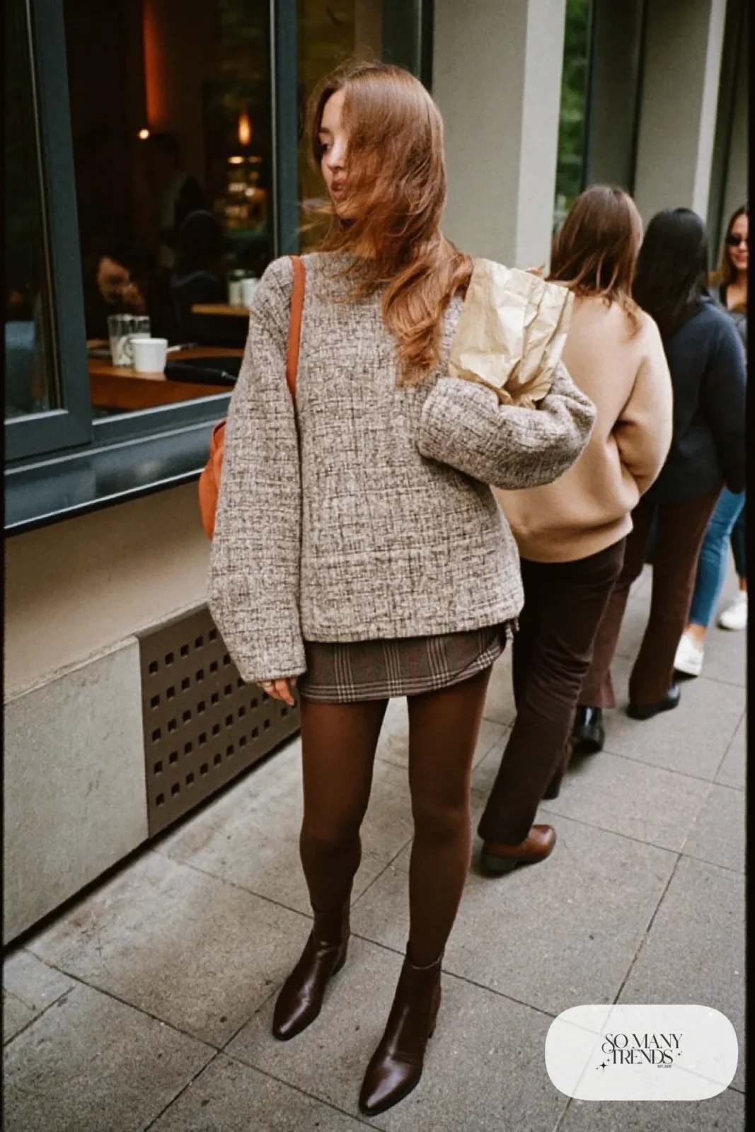 Brown plaid wool mini skirt with oversize oatmeal knit sweater, black opaque tights and brown boots, outfit 17