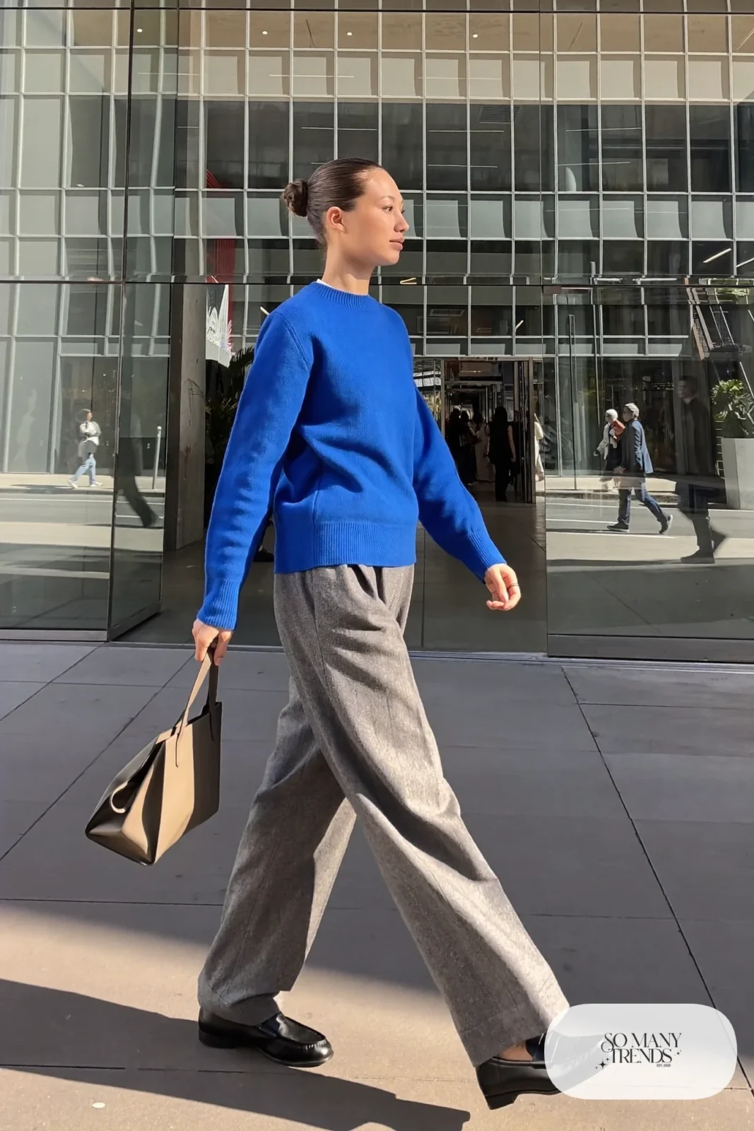 Cobalt knit sweater, gray wide-leg pants and black leather loafers, outfit 1