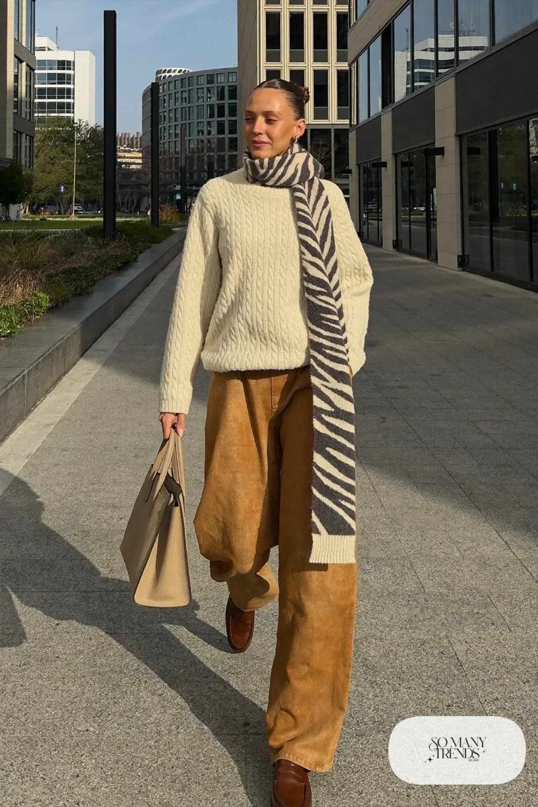 Cream knit sweater, gray zebra print scarf, camel wide-leg pants and brown loafers, outfit 24