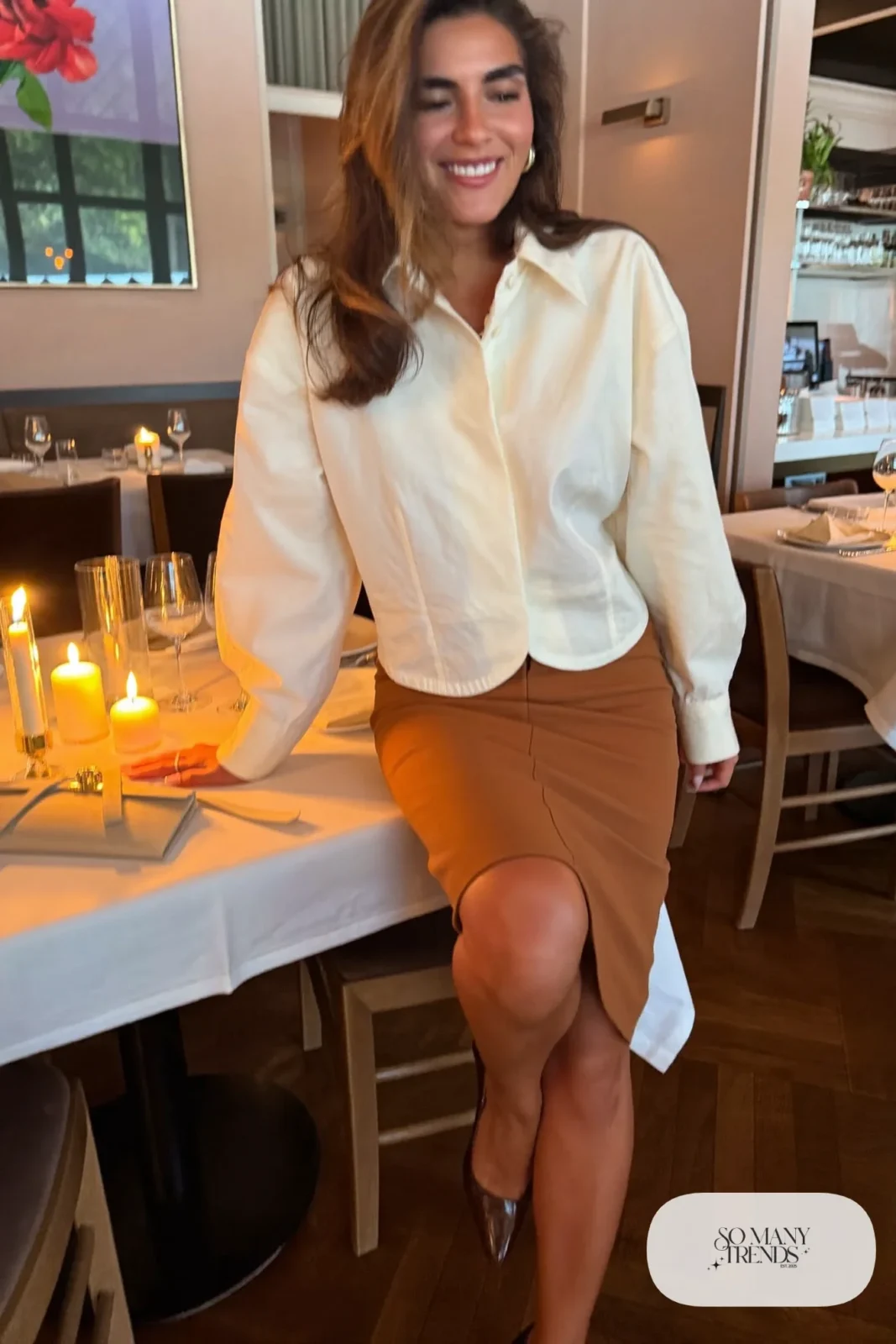 Look 22: ivory blouse with sheer sleeves, camel pencil skirt, brown pumps, small clutch
