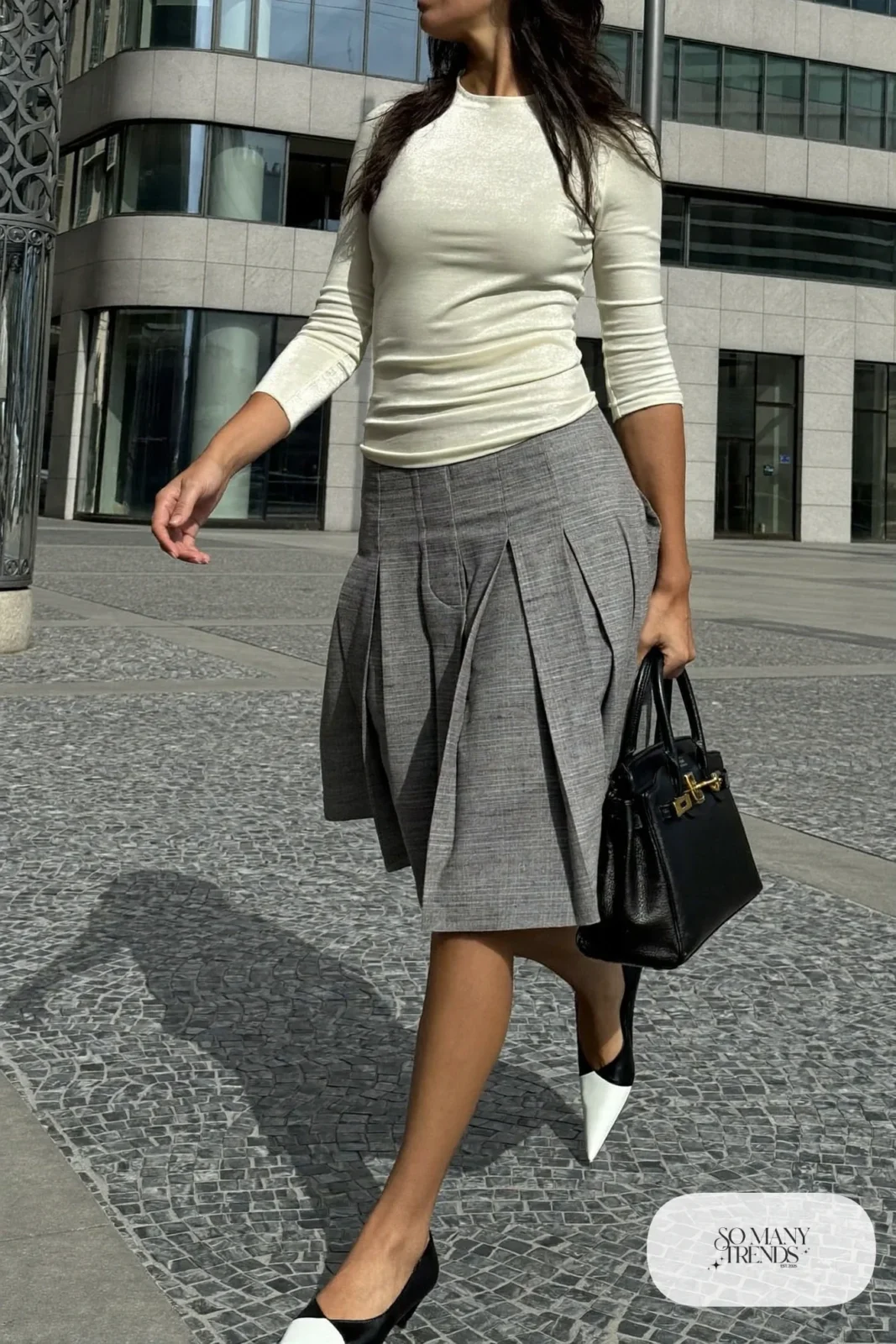 Heather gray pleated midi skirt, ivory knit top and black pointed flats, outfit 10