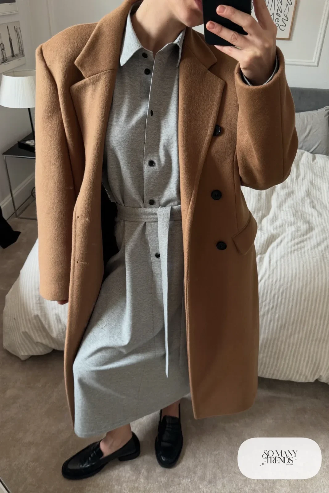 Heather gray belted shirt dress, camel coat and black loafers in a mirror selfie, outfit 12