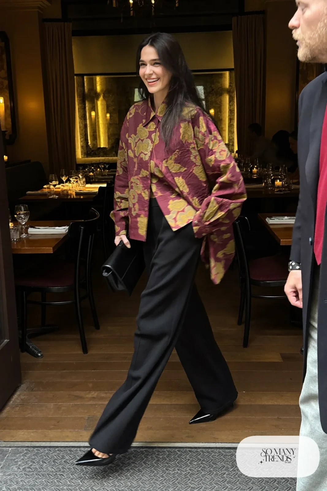 Look 13: burgundy and olive floral blouse, black wide-leg pants, black pointed heels, small clutch