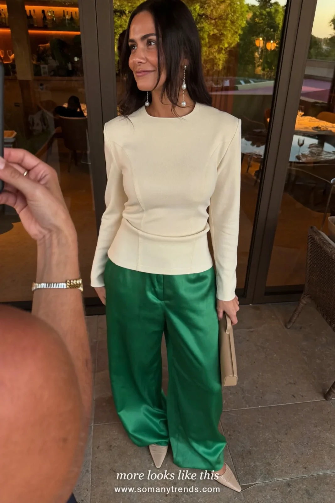 Emerald satin pants with cream fitted top, pearl drop earrings and heels, outfit 9