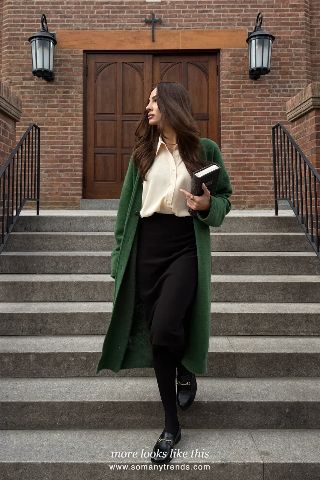 Woman in a forest green long cardigan, cream blouse, black midi skirt and loafers, church outfit 5