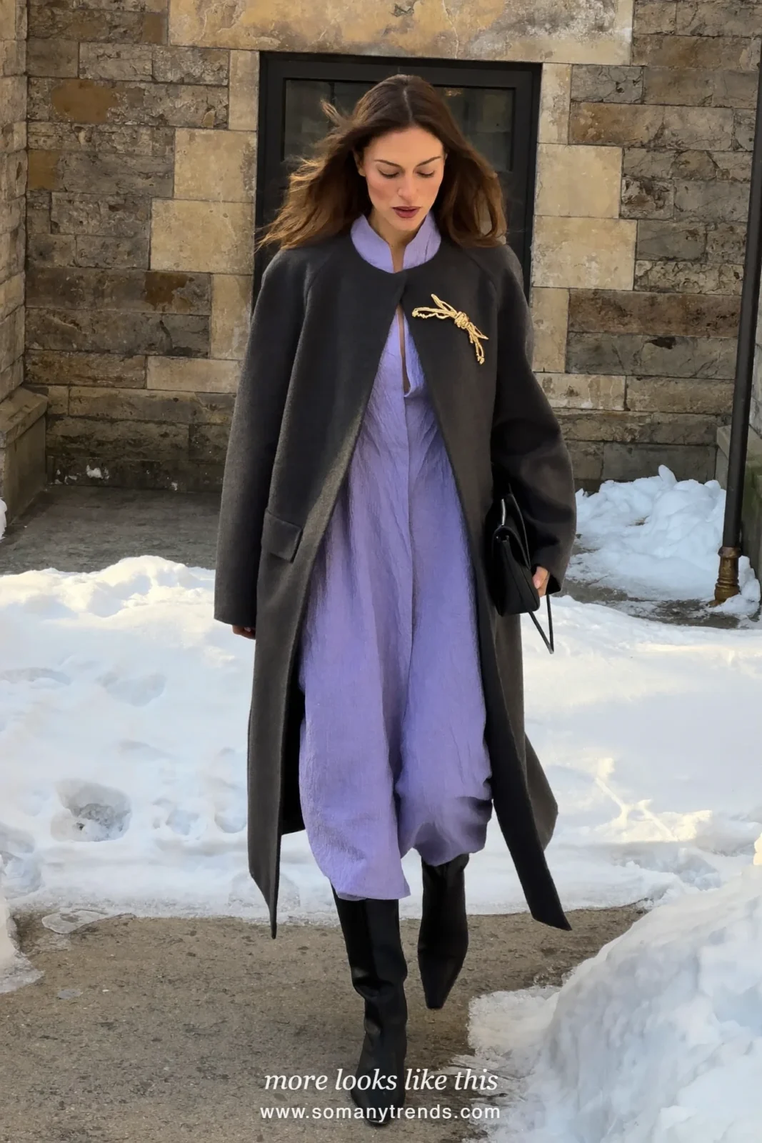 Woman in a lavender midi dress, long charcoal coat, gold brooch and black boots, church outfit 23