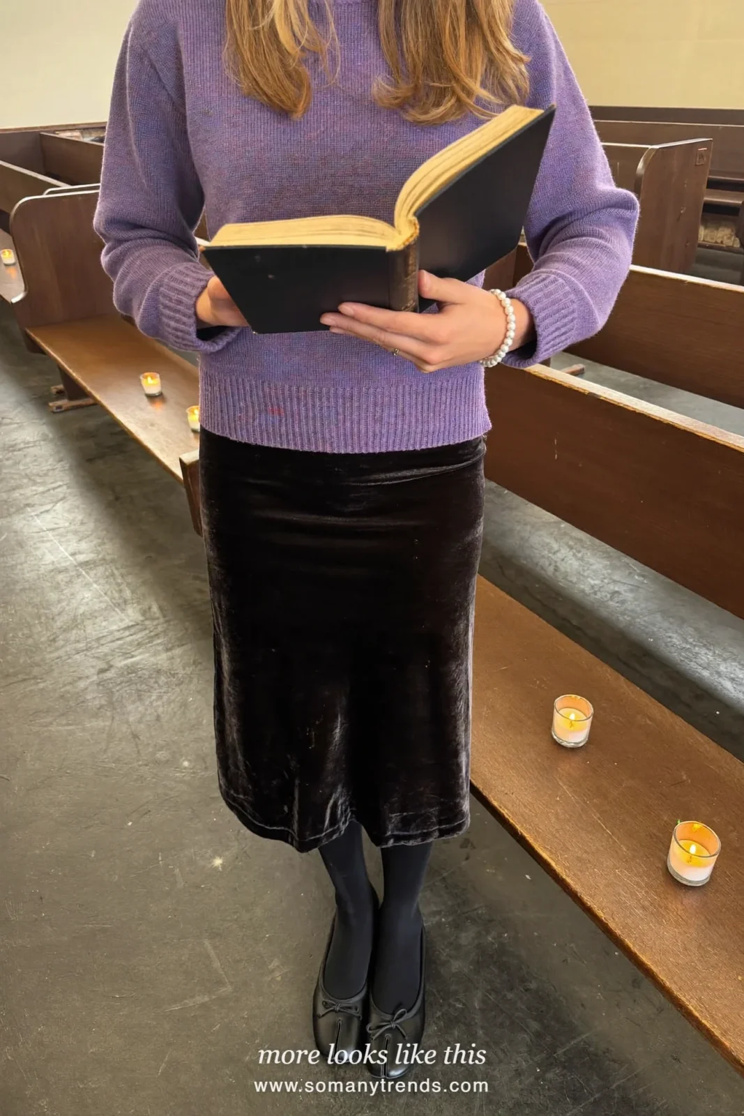 Woman in a lavender knit sweater, black velvet midi skirt, pearl bracelet and flats, church outfit 30