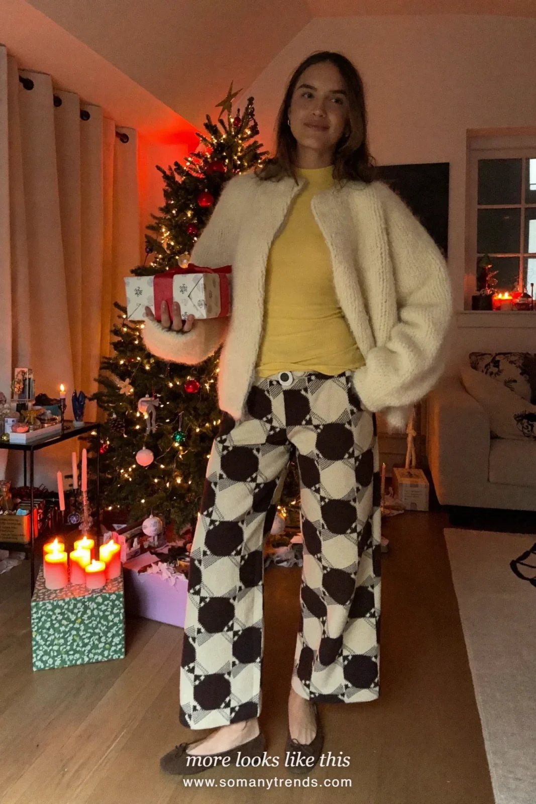 Ecru cardigan over a butter yellow top with wide plaid pants and ballet flats, Christmas outfit 14