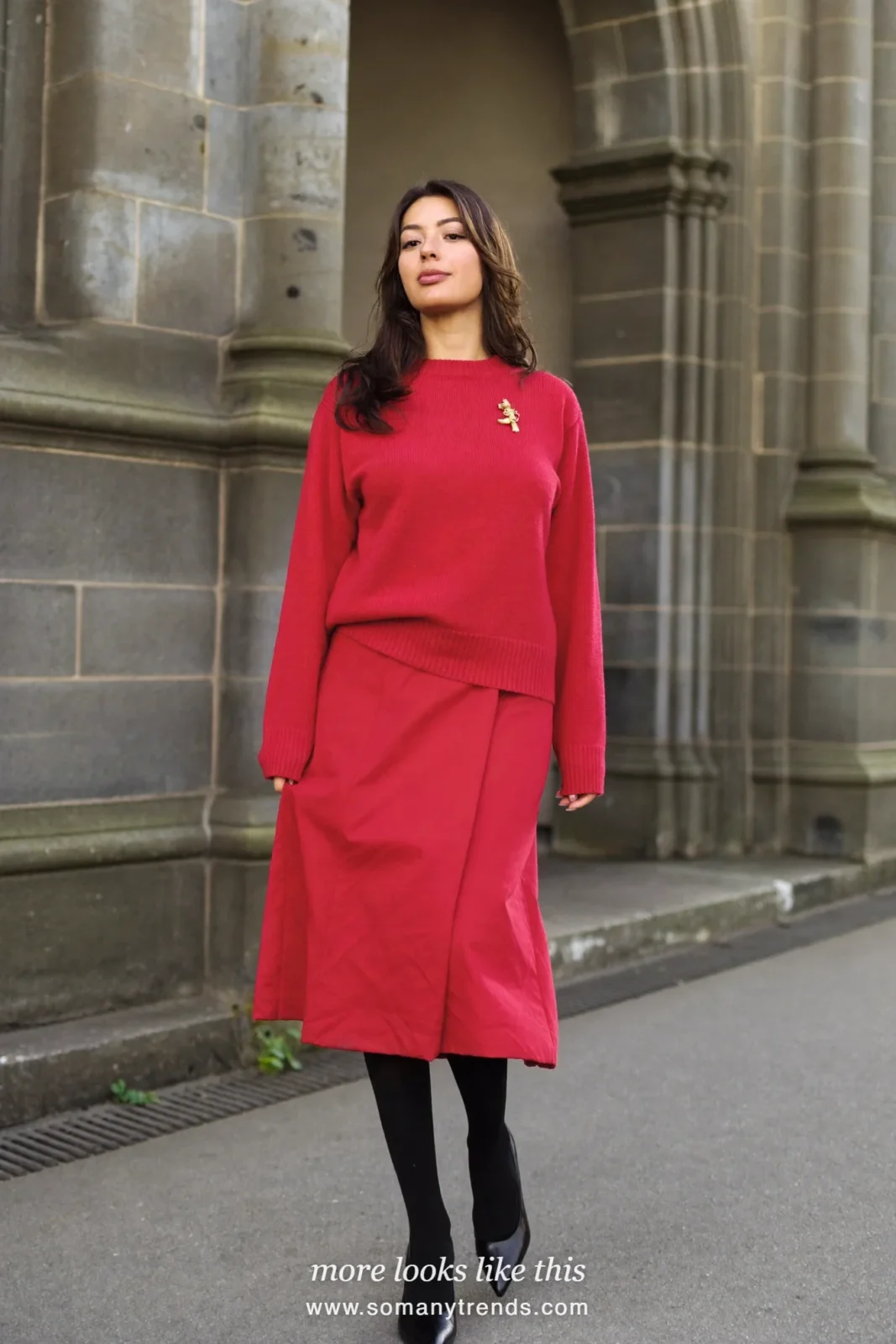 Woman in a deep red ribbed sweater and red midi skirt, brooch, black tights and pumps, church outfit 26