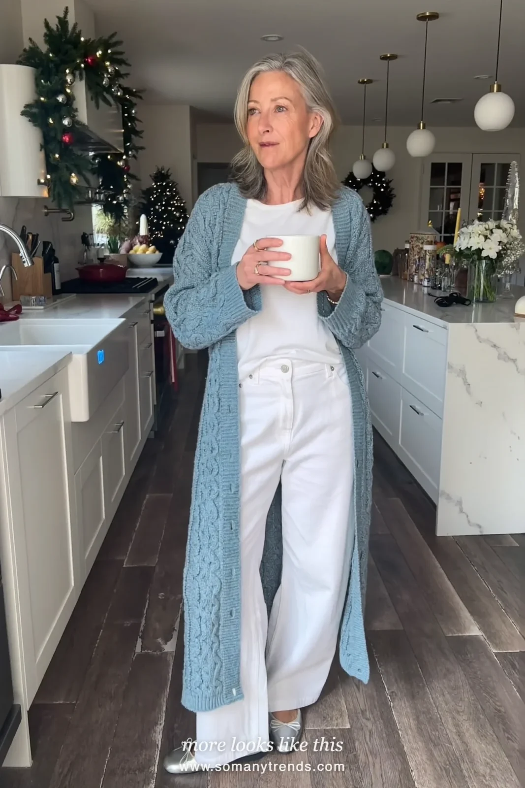 Woman in an icy blue knit cardigan, white tee, white wide-leg pants and silver flats at a family Christmas brunch, outfit 5