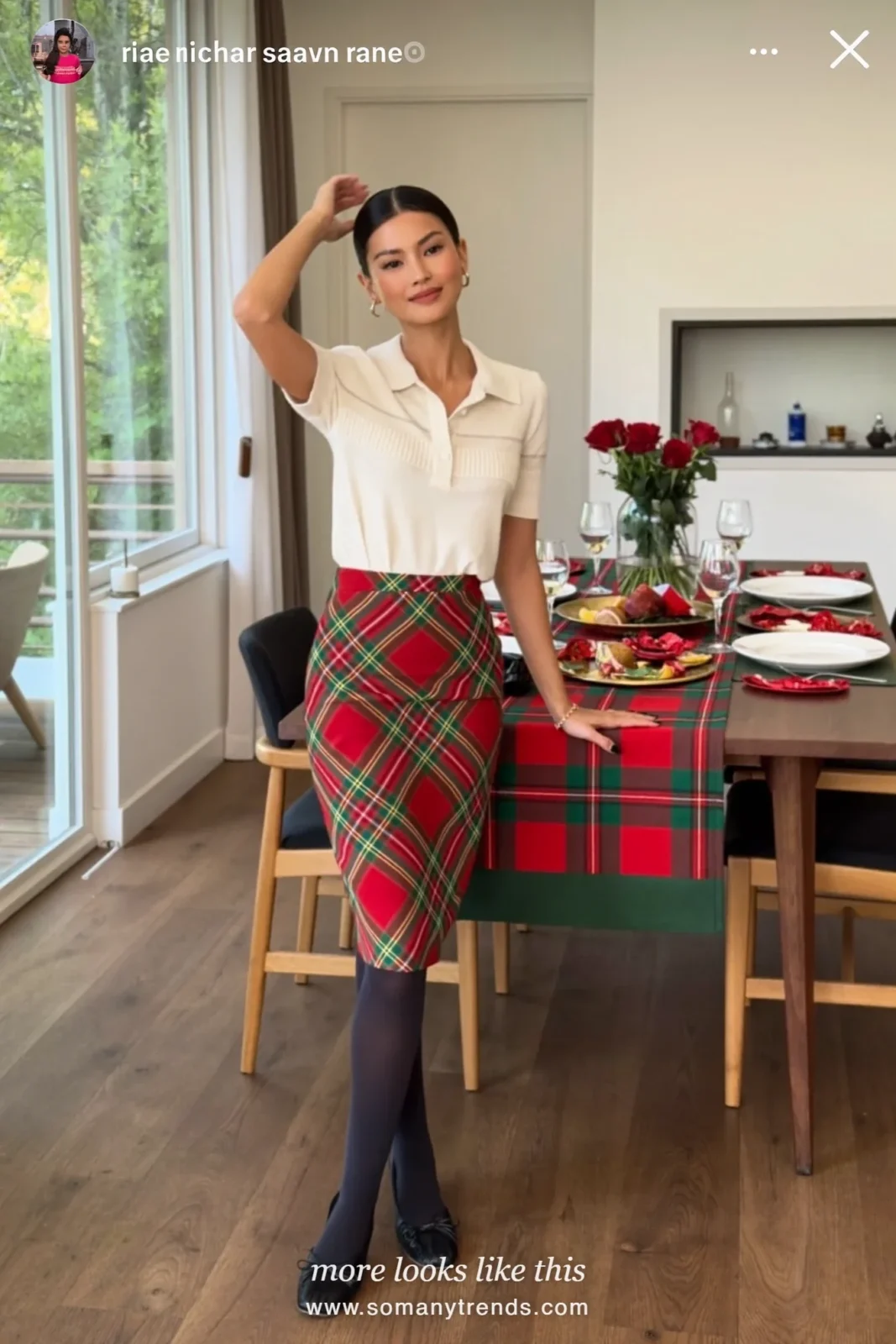 Woman in a red and green tartan pencil skirt, cream knit polo, black sheer tights and black flats at a brunch table, outfit 2