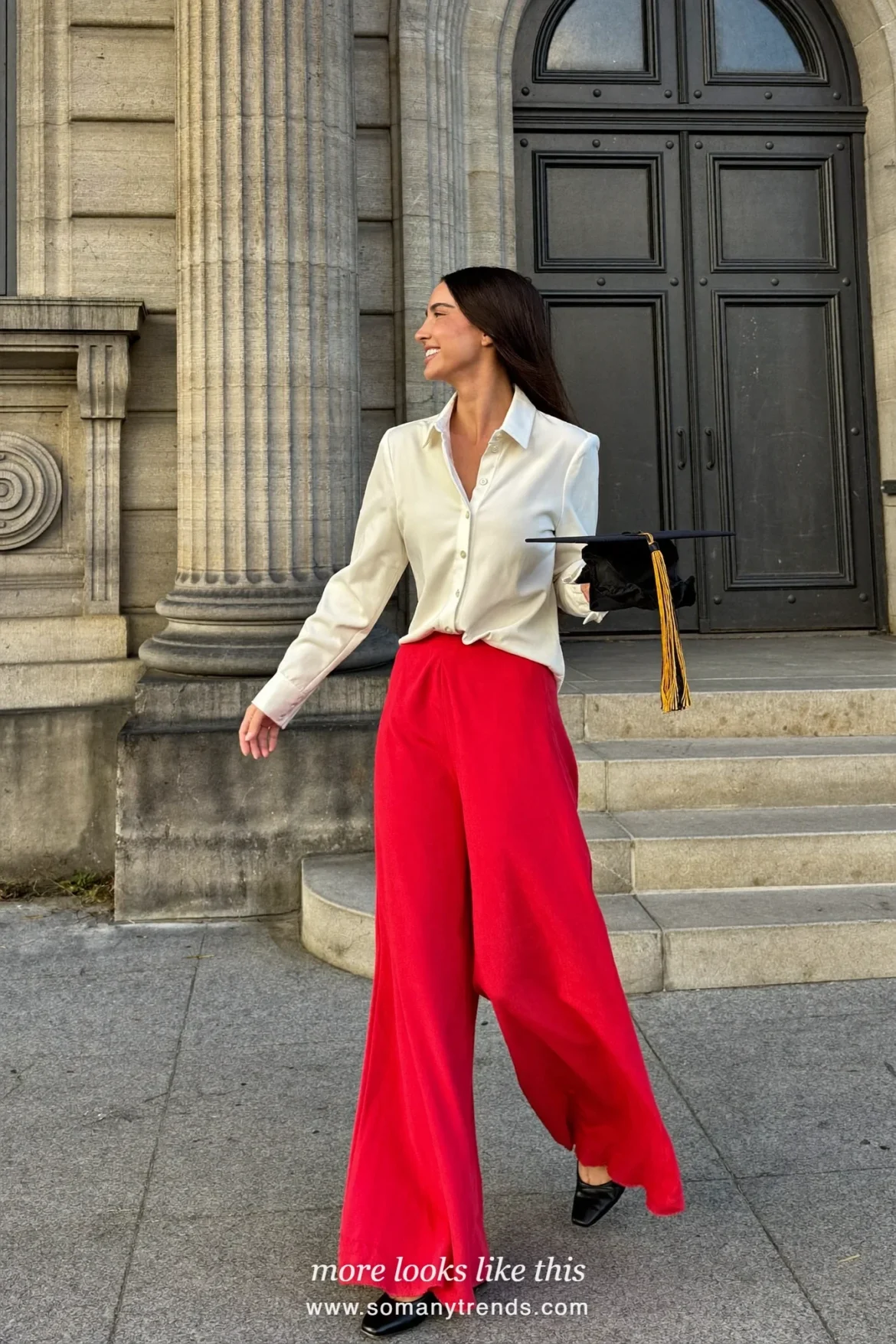 Woman wearing an ivory pointed-collar blouse, wide-leg red pants and black low-heel loafers, winter graduation outfit 6