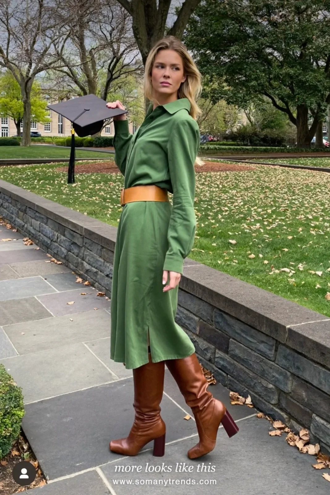 Woman wearing a pine green long-sleeve midi shirt dress, wide camel leather belt and tall brown block-heel boots, winter graduation outfit 11