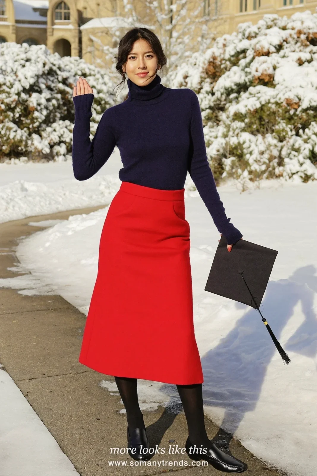 Woman wearing a navy fine-knit turtleneck, red wool A-line midi skirt, black opaque tights and black low-heel loafers, winter graduation outfit 26