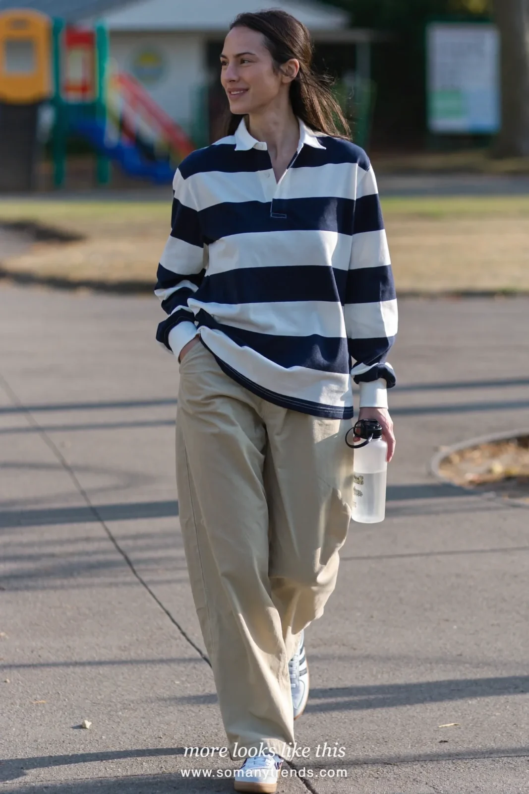 Navy and ivory striped rugby shirt with wide oatmeal chinos and white sneakers, outfit 2