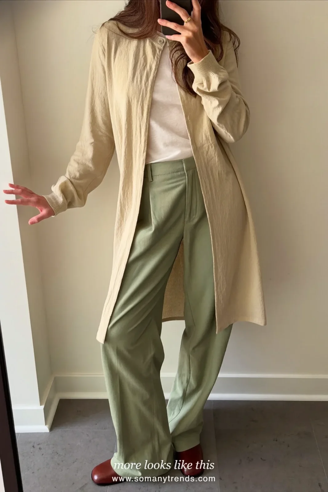 Oatmeal cotton cardigan over white tee with sage wide-leg pants and brown leather mules, mirror selfie, outfit 4