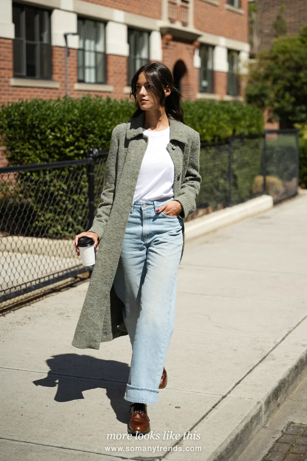 Long sage knit cardigan coat over a white tee with wide light-wash jeans and brown derby shoes, outfit 10