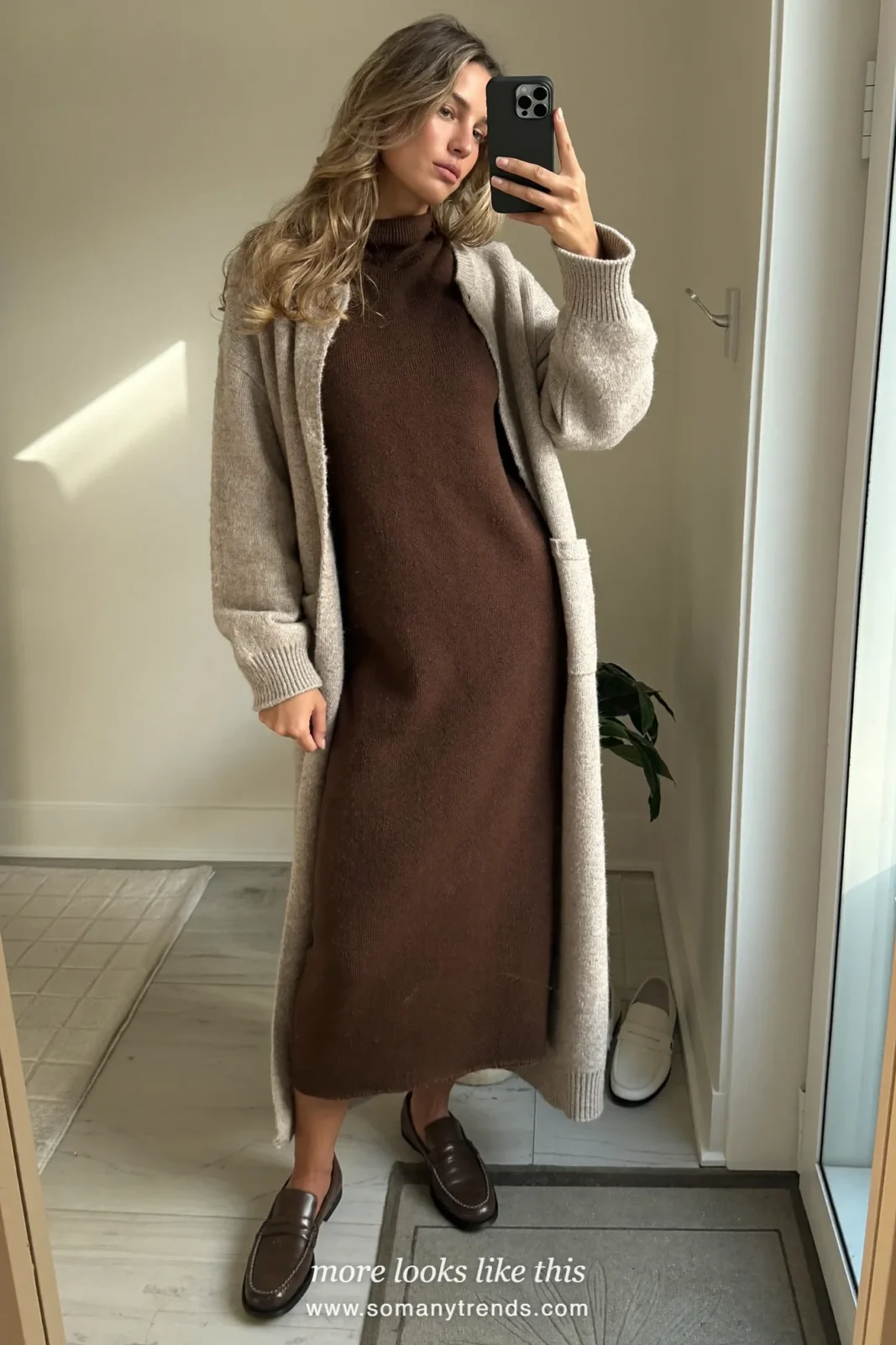 Espresso loose knit midi dress with a long oatmeal open cardigan and brown loafers, outfit 16