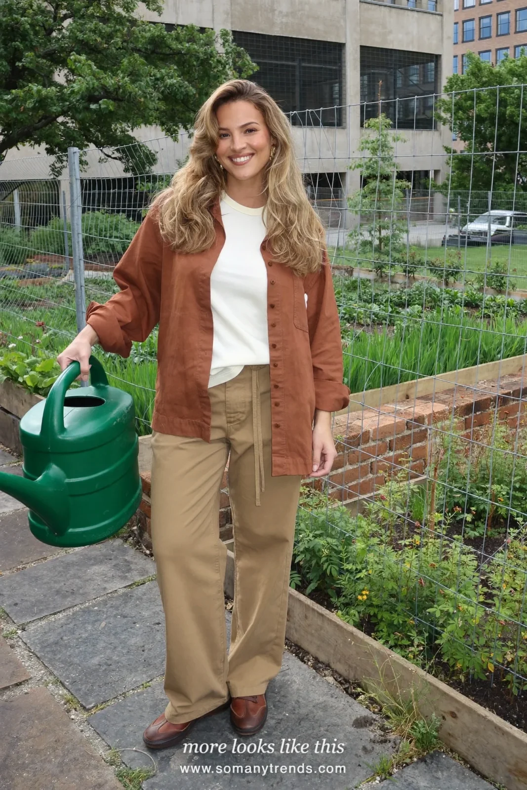 Rust cotton twill overshirt over a cream tee with relaxed tan pants and brown leather sneakers, outfit 21