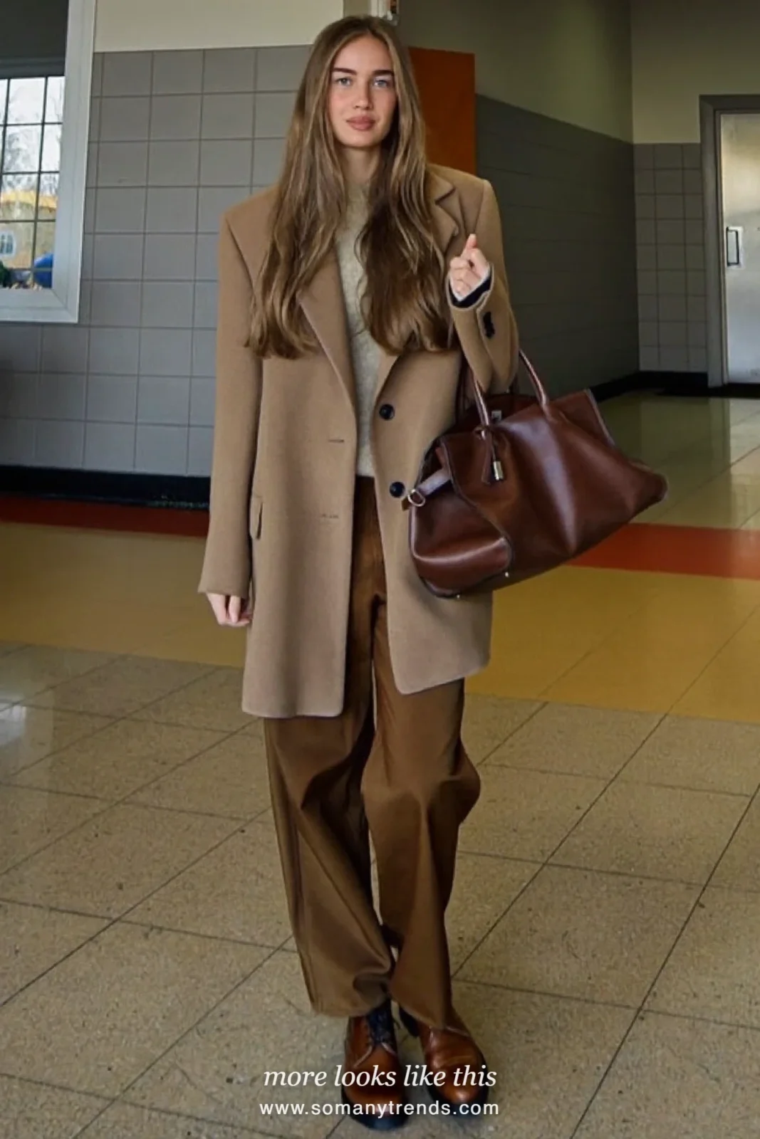 Long camel wool-blend blazer over an oatmeal knit with wide espresso pants and brown derby shoes, outfit 25