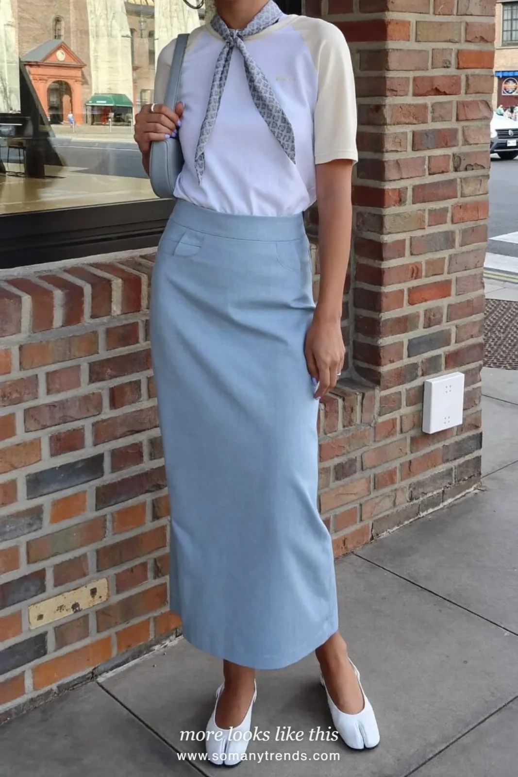 Woman in a white baseball tee, long icy blue column skirt, skinny silver scarf and white slingback flats, spring church outfit 5