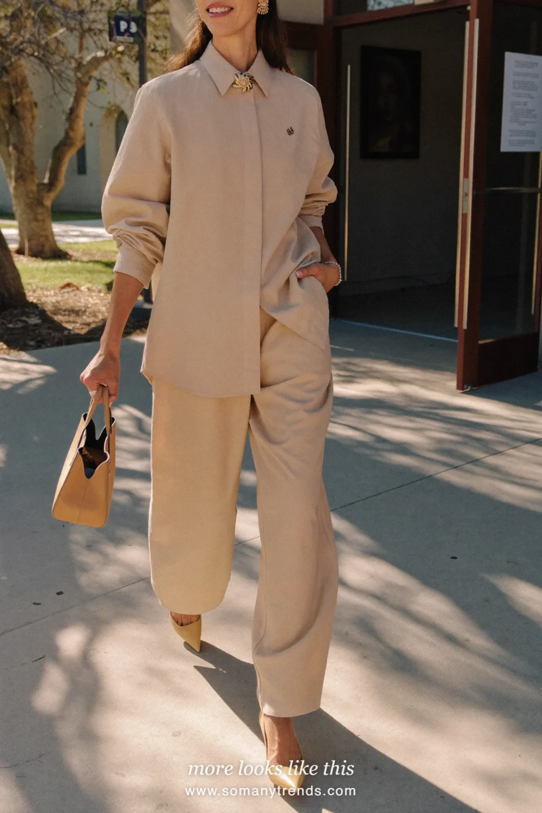 Woman in a beige shirt tucked into wide-leg beige pants with tan pointed pumps, spring church outfit 7
