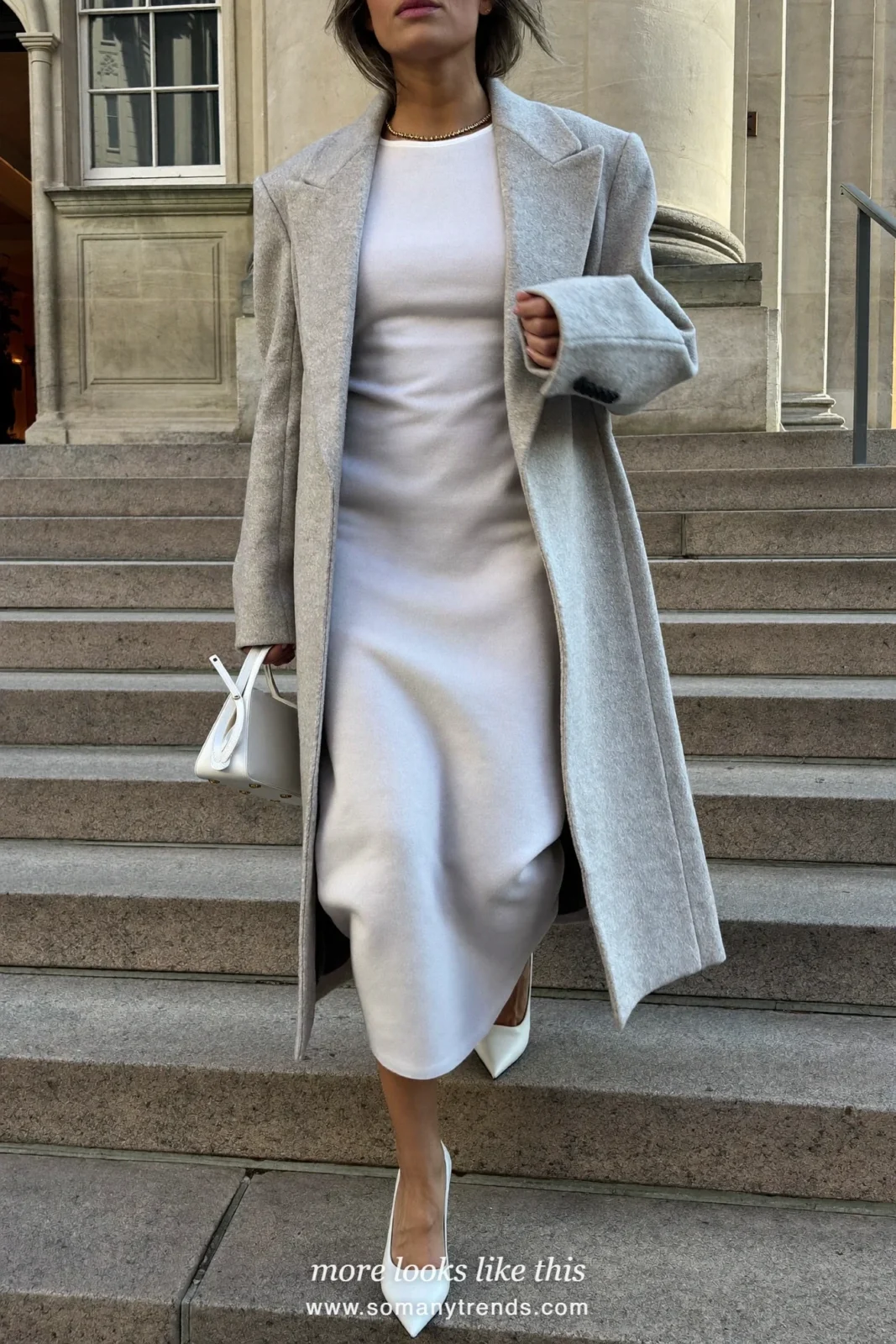 Woman in a light gray relaxed coat, white midi dress and white pumps, spring church outfit 26